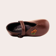 ZAPATILLA CON DETALLE LATERAL DE FLOR