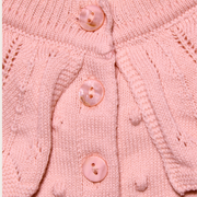 PELELE MANGA LARGA CON DETALLE EN EL CUELLO